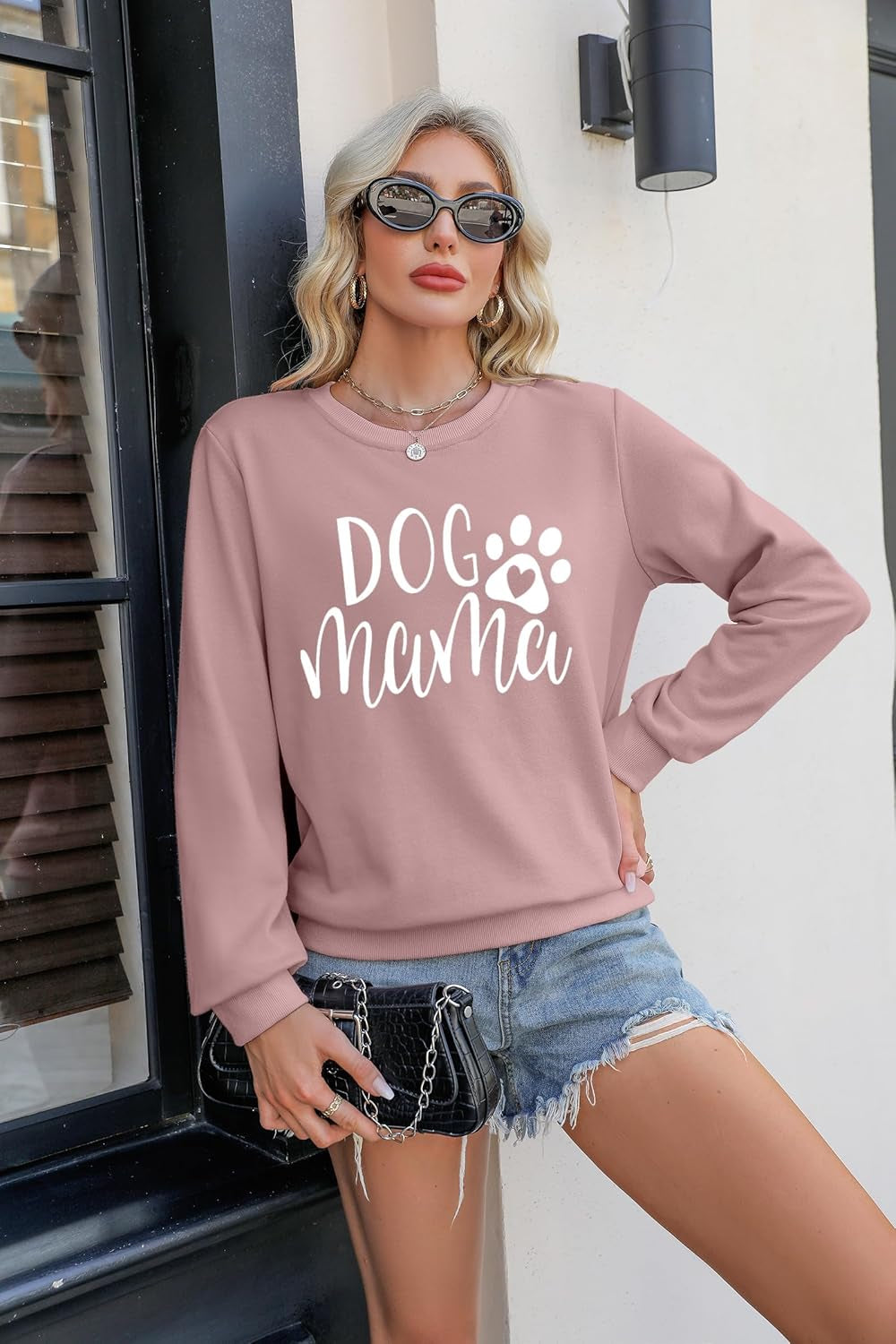 Dog Mom pink women's sweatshirt with white paw heart graphic, long-sleeve pullover